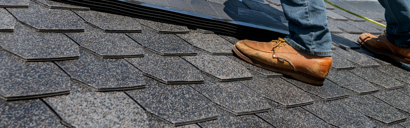 Courses of architectural asphalt shingles on a new roof